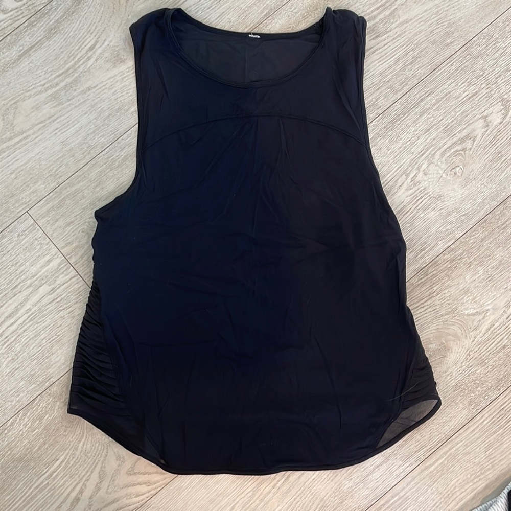 LULULEMON tank top! Mesh on sides. WORN ONCE. size 4